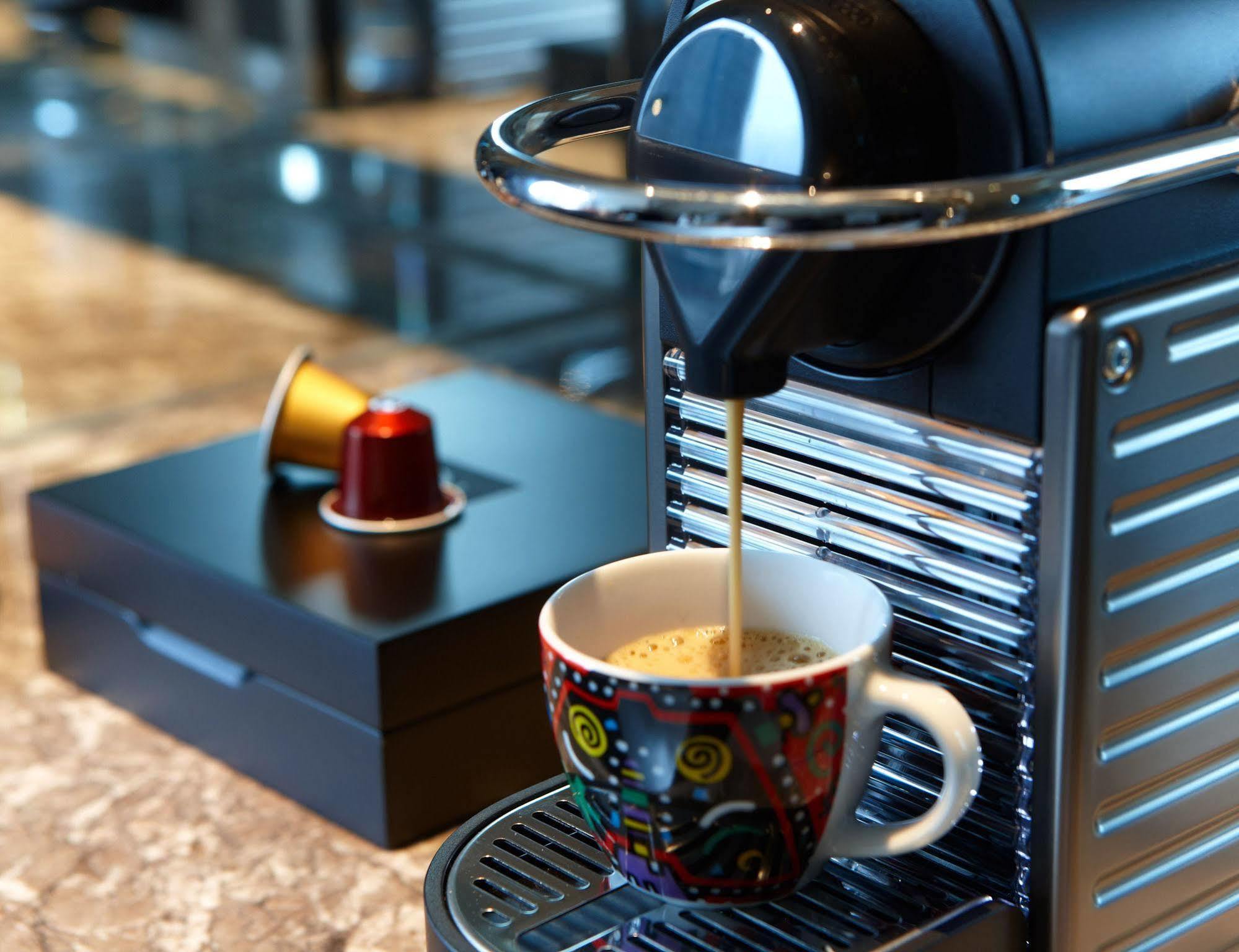 Humble House Taipei, Curio Collection By Hilton Hotell Exteriör bild A Nespresso machine